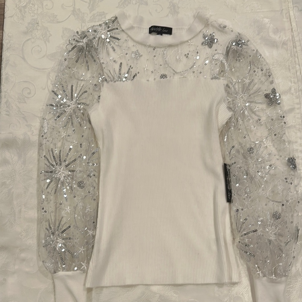 White long sleeve blouse with detailed sleeves
